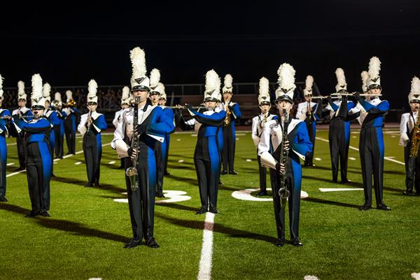 Brentwood High band members play on the football field